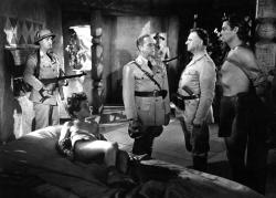 Boy and Tarzan held captive by Nazis in Tarzan Triumphs. Boy and Tarzan held captive by Nazis in Tarzan Triumphs.
