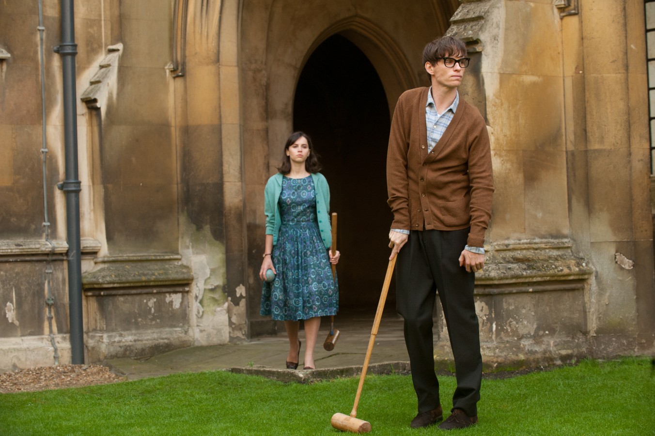 Felicity Jones and Eddie Redmayne in The Theory of Everything. Felicity Jones and Eddie Redmayne in The Theory of Everything.