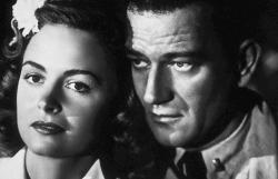 Donna Reed and John Wayne in They Were Expendable.