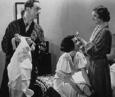 William Powell, Maureen OSullivan and Myrna Loy in The Thin Man.