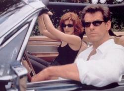 Rene Russo and Pierce Brosnan in The Thomas Crown Affair. Rene Russo and Pierce Brosnan in The Thomas Crown Affair.