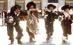 Oliver Reed, Frank Finlay, Michael York, and Richard Chamberlain in The Three Musketeers.