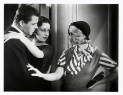 Lyle Talbot, Ann Dvorak and Joan Blondell in Three on  a Match.