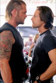 Two men jealous of each others crotch rockets. Two men jealous of each others crotch rockets.