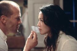 Jason Statham and Qi Shu in The Transporter.