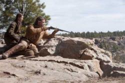Hailee Steinfeld and Matt Damon in True Grit. Hailee Steinfeld and Matt Damon in True Grit.