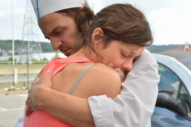 Fabrizio Rongione and Marion Cotillard in Two Days, One Night Fabrizio Rongione and Marion Cotillard in Two Days, One Night