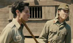 Jack O'Connell and Takamasa Ishihara in Unbroken.