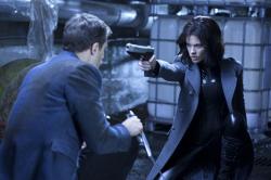 Kate Beckinsale takes aim at Theo James in Underworld Awakening Kate Beckinsale takes aim at Theo James in Underworld Awakening