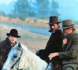 Jaimz Woolvett, Morgan Freeman and Clint Eastwood in Unforgiven.