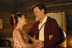 Kristen Wiig and John C. Reilly in Walk Hard: The Dewey Cox Story. Kristen Wiig and John C. Reilly in Walk Hard: The Dewey Cox Story.