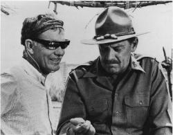 Sam Peckinpah and William Holden while filming The Wild Bunch