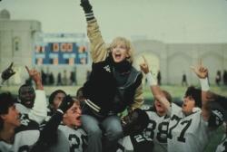 Goldie Hawn on the shoulders of Woody Harrelson and Wesley Snipes in Wildcats. Goldie Hawn on the shoulders of Woody Harrelson and Wesley Snipes in Wildcats.