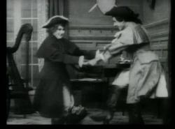 Mary Pickford dresses as a man in Wilful Peggy. Mary Pickford dresses as a man in Wilful Peggy.