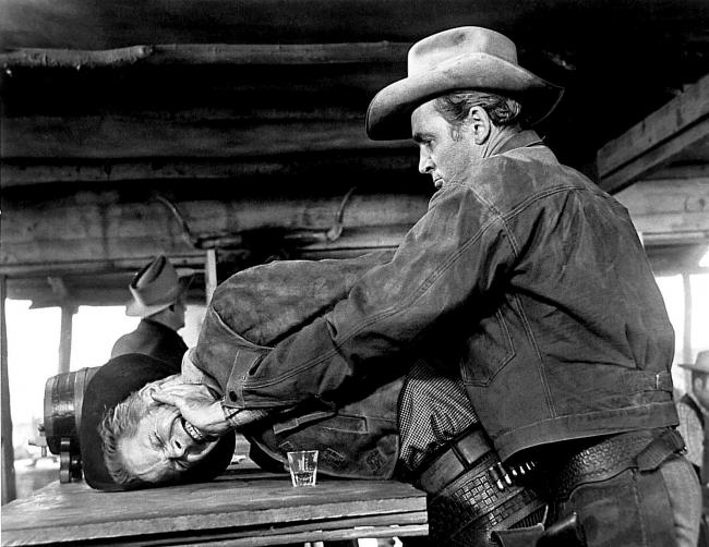 Dan Duryea and Jimmy Stewart in Winchester '73. Dan Duryea and Jimmy Stewart in Winchester '73.