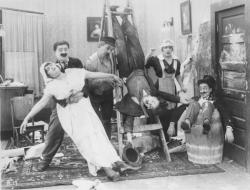 Chaplin creates mild hi-jinks in the early short Work. Chaplin creates mild hi-jinks in the early short Work.